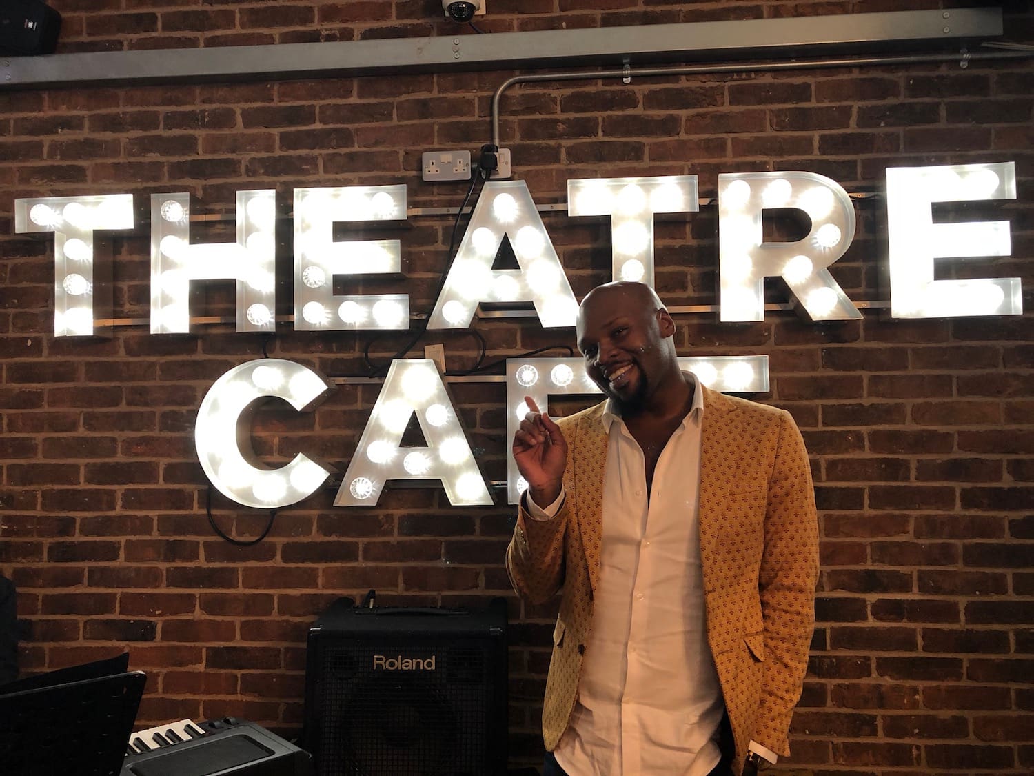 Featured image for “Watch Aladdin’s Michael James Scott’s exclusive live performance at The Theatre Cafe”