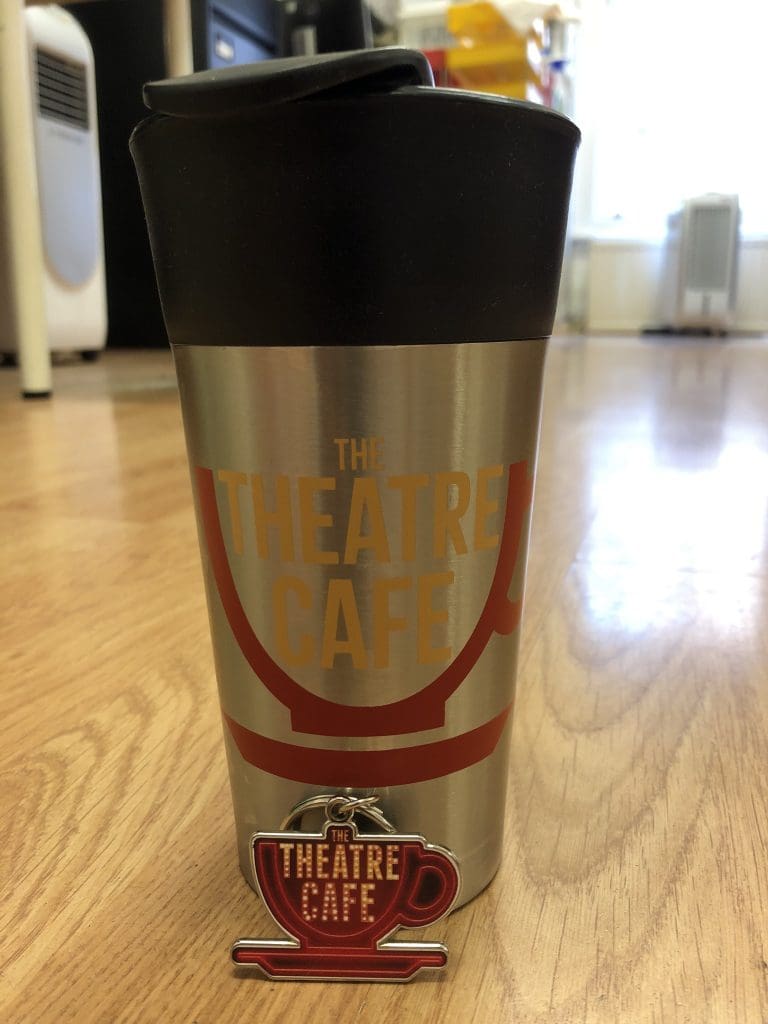theatre cafe travel cup key ring