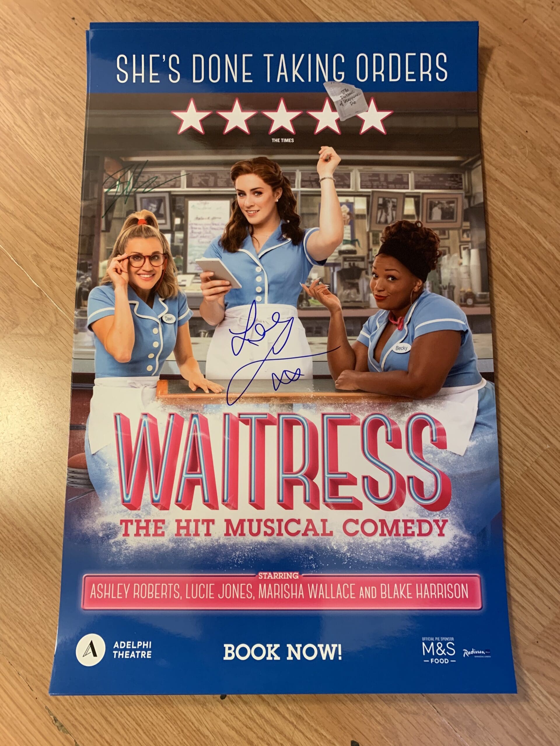 Featured image for “Enter our competition for a chance to win a Waitress poster signed by Blake Harrison and Lucie Jones”