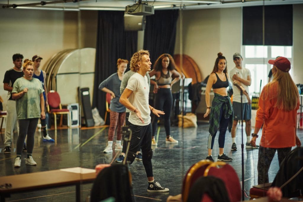 Glenn Adamson & the company in rehearsals for Bat Out of Hell The Musical, credit Chris Davis Studio